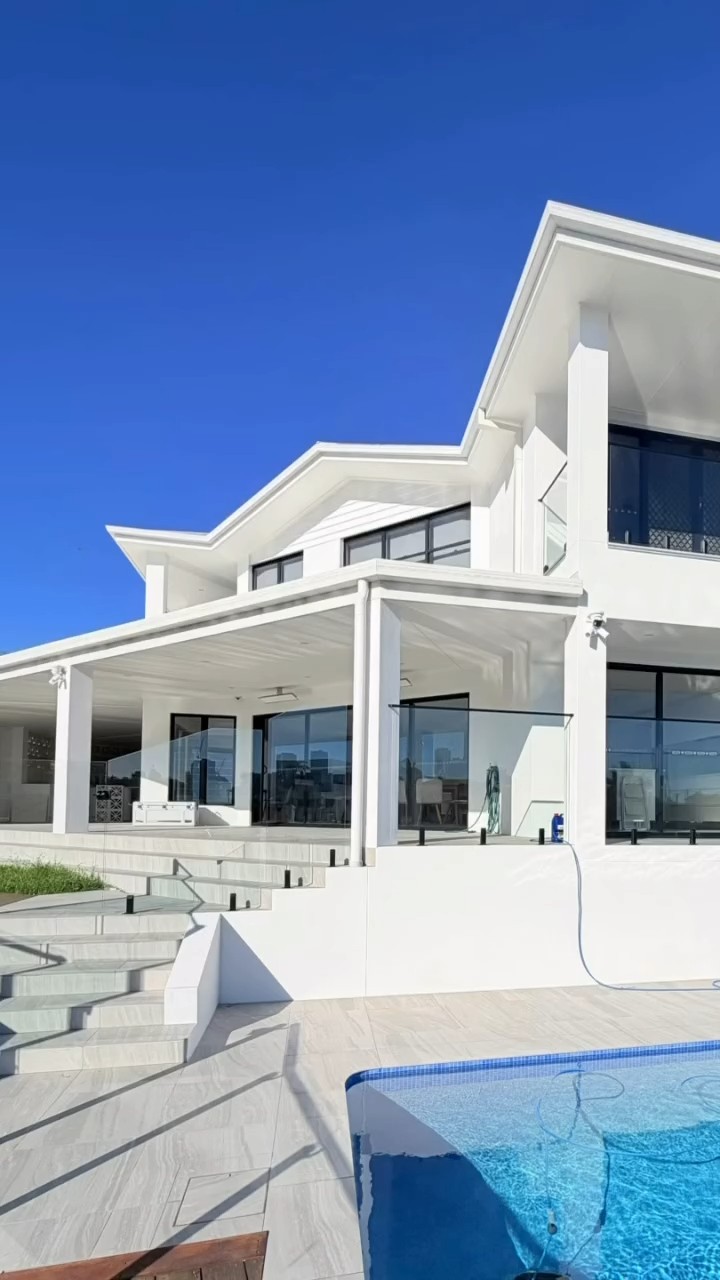 White painted patio extension and pool area on a Broadbeach Waters waterfront home