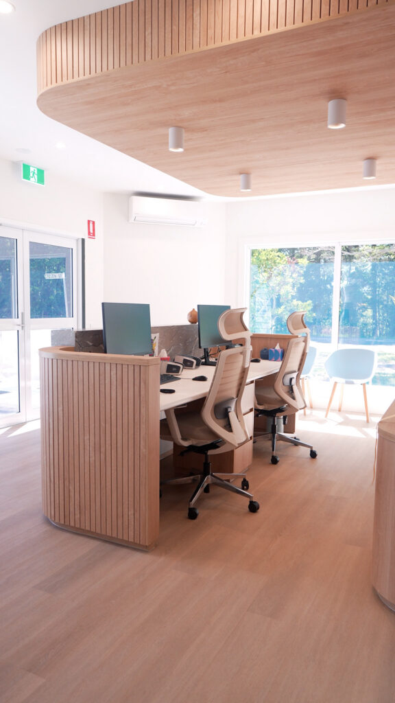 Freshly painted office fit-out with timber slat feature ceiling, Brunswick project by We Paint Gold Coast