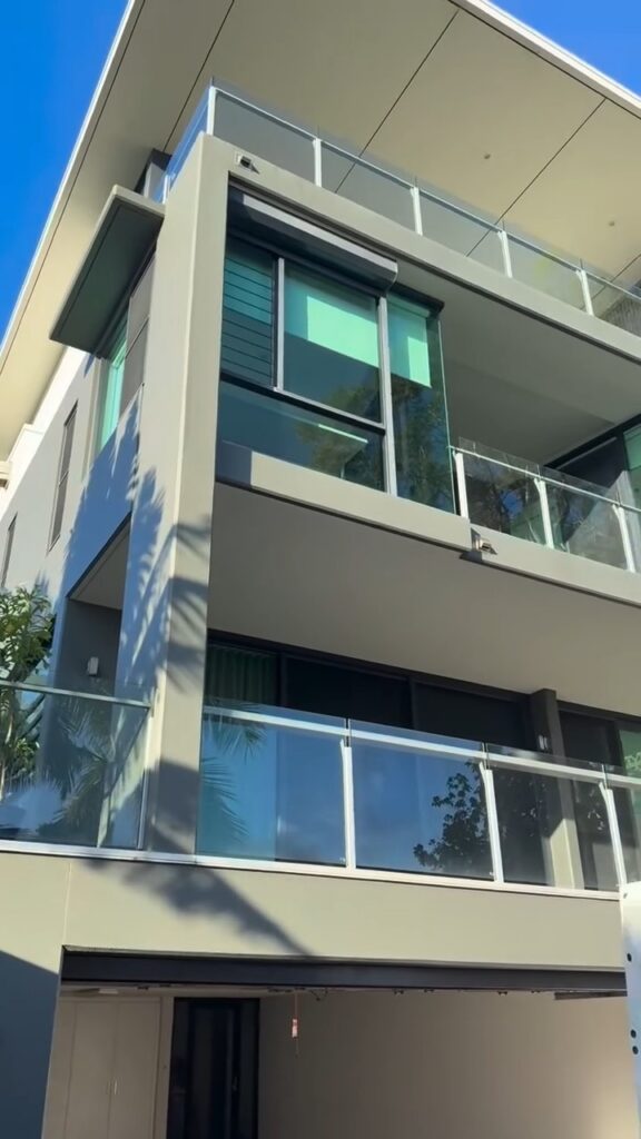 Freshly painted multi-level architectural home in Burleigh with glass balustrades, We Paint Gold Coast