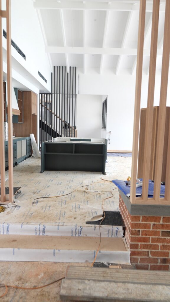 White painted coffered ceiling and timber slat staircase in a new build home, Coomera, painted by We Paint Gold Coast