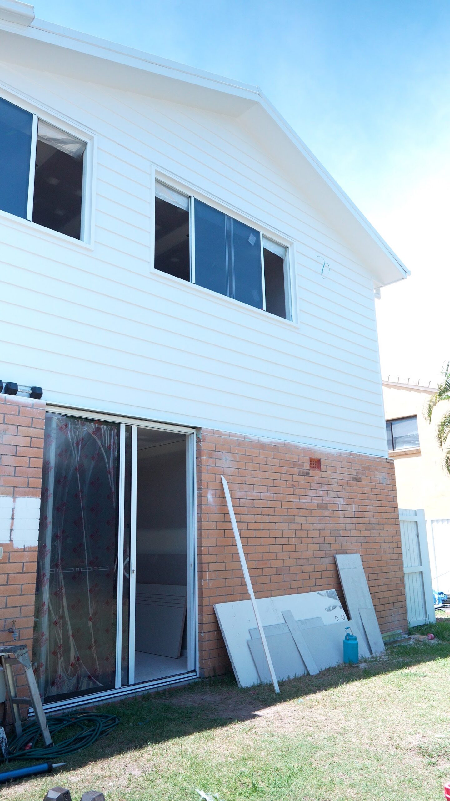 White weatherboard beach house exterior freshly repainted in Palm Beach by We Paint Gold Coast